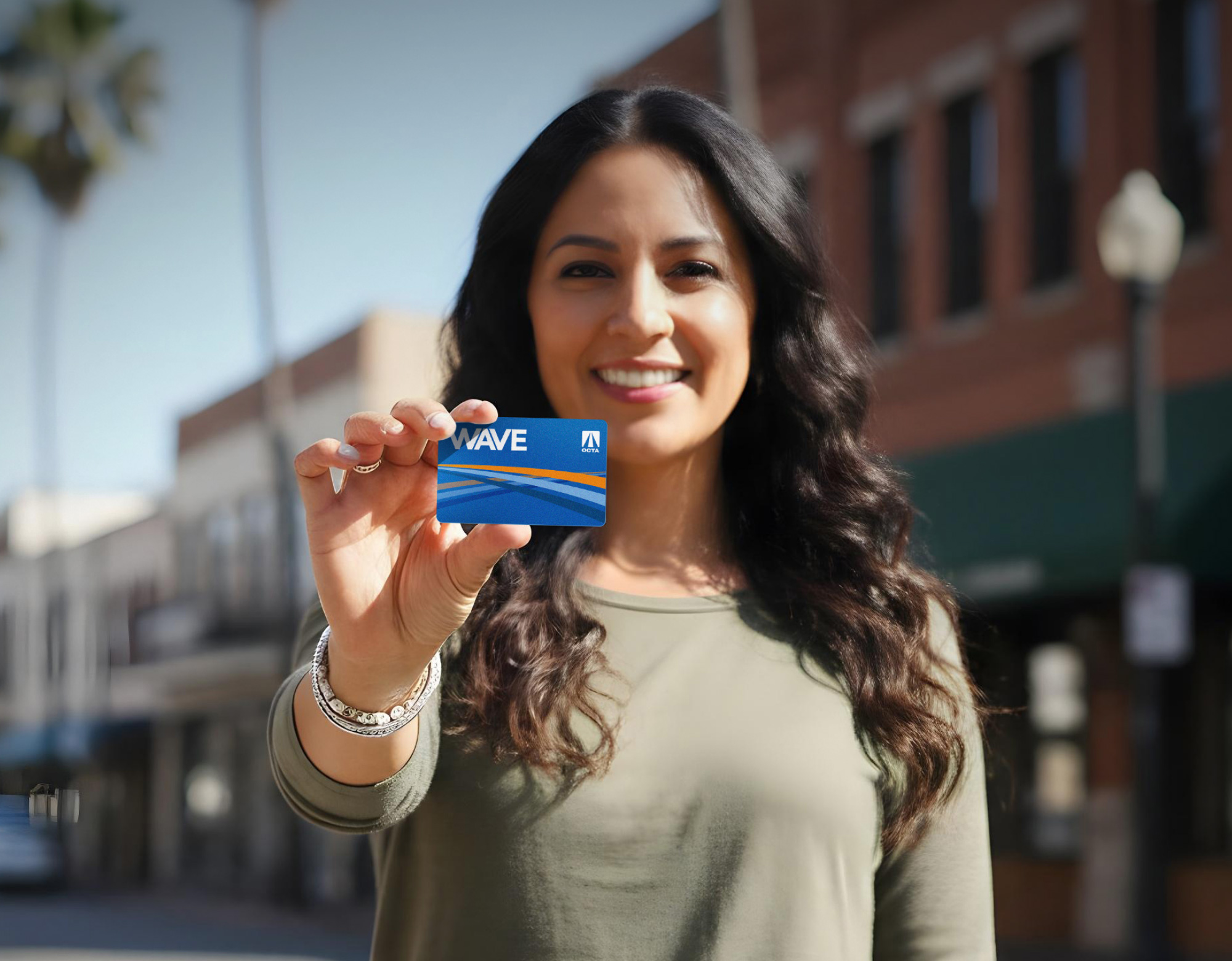 Photo of woman holding wave card